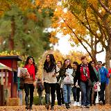 Students Walking on Campus in Autumn