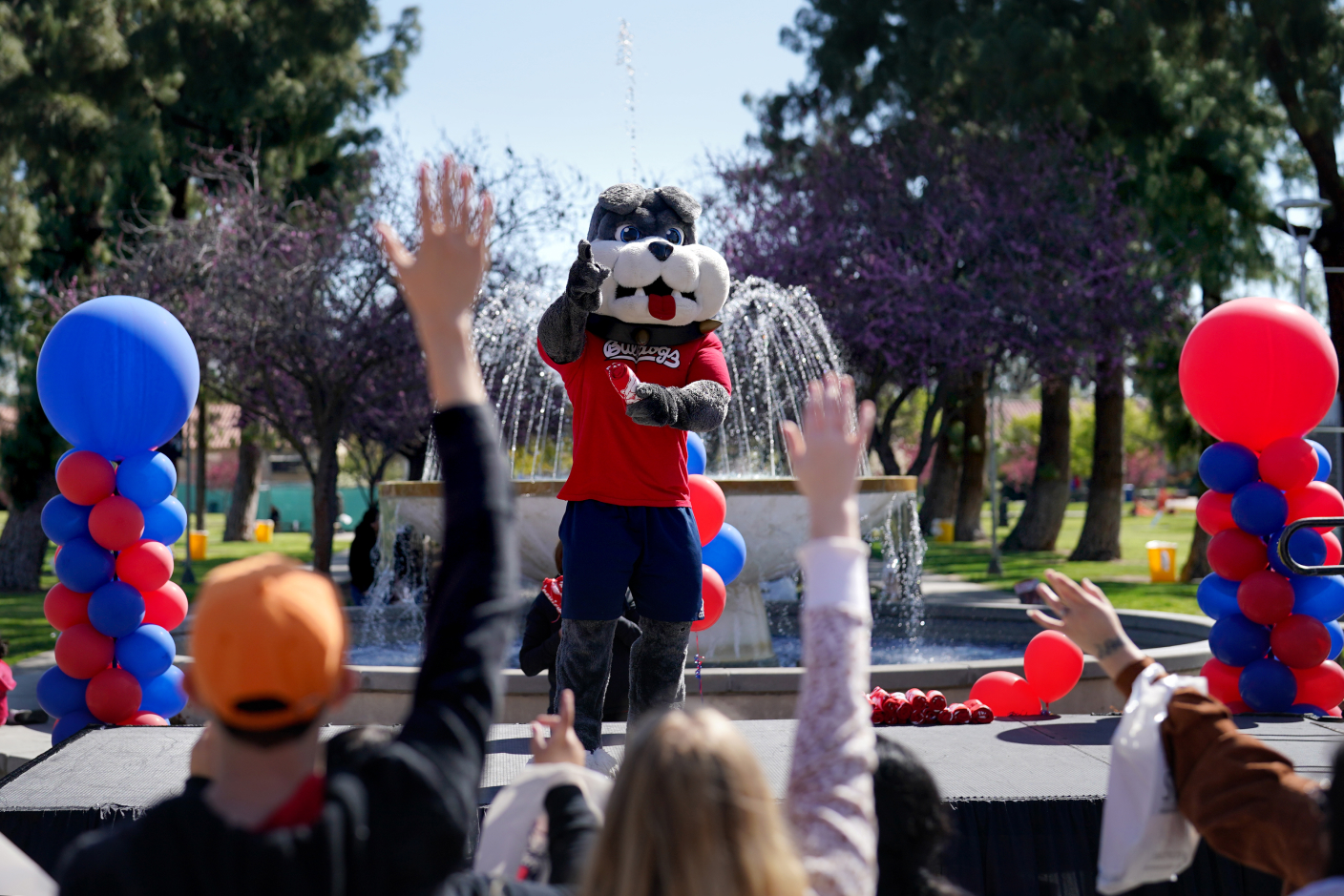 Fresno State mascot dancing on fountain