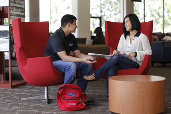 Woman advising a student 