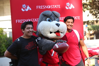 Students Posing with Bulldog Mascot