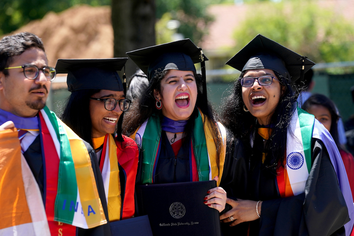 Students in their graduation regalia