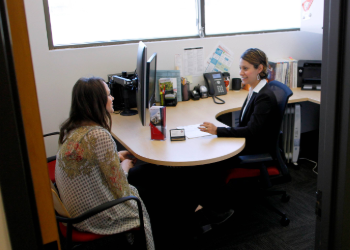 Fresno State advisor talking with student