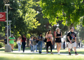 Fresno State students walking across campus