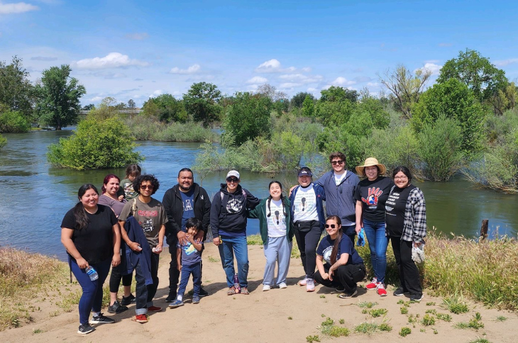 group of students by the lake