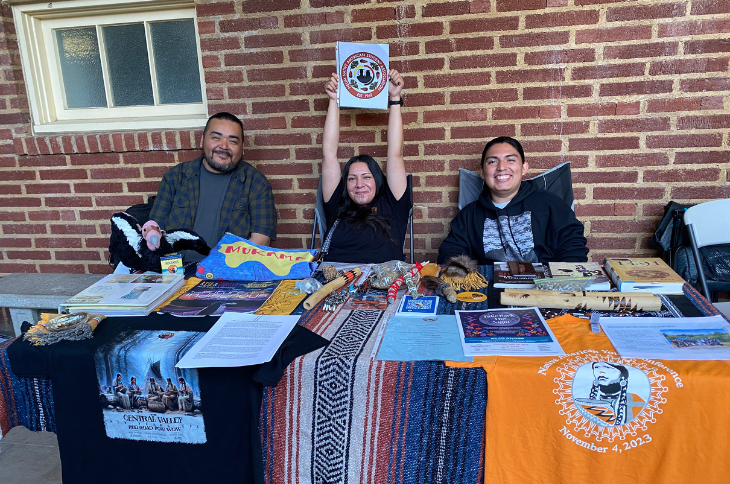 students behind their booth
