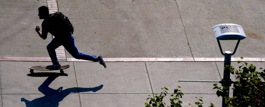 student skateboarding