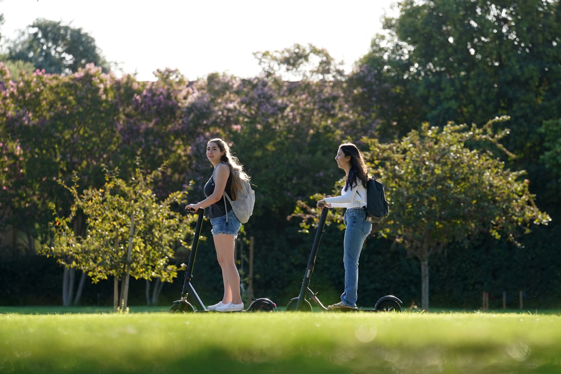 Two Students on their scooters