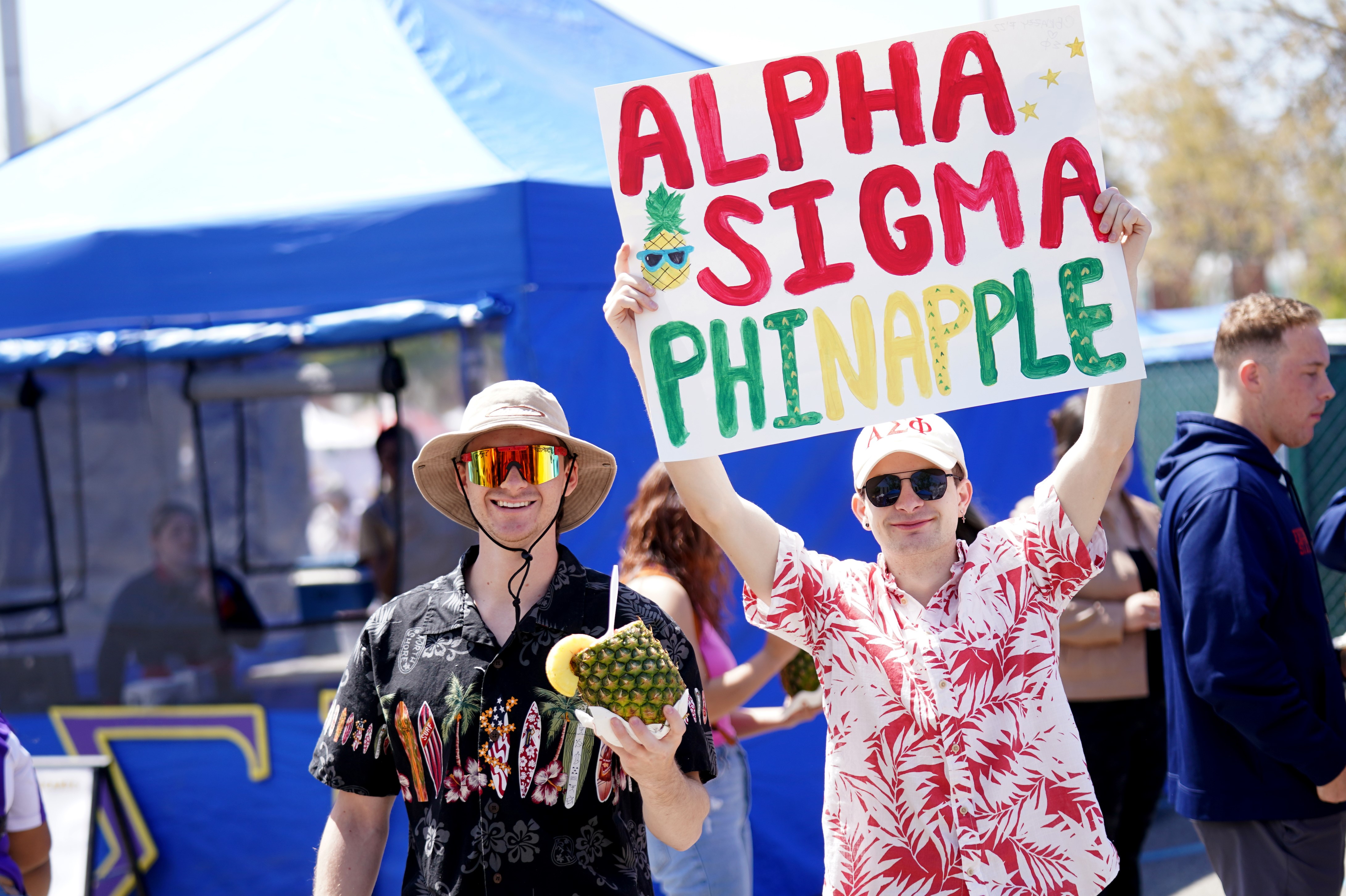 Alpha Sigma Phi members sell their famous pineapple bowls at Vintage Days