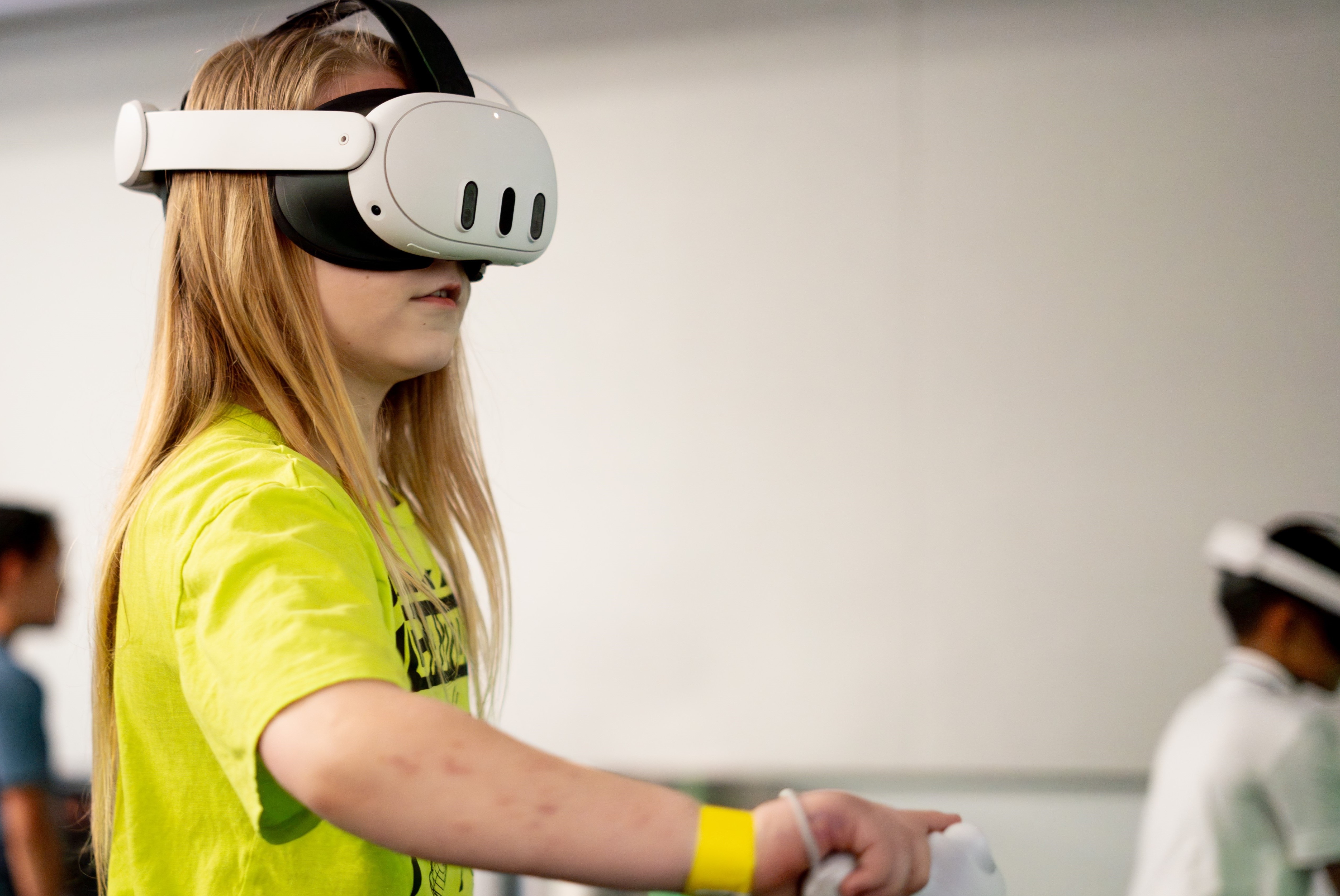 Little girl playing a VR game