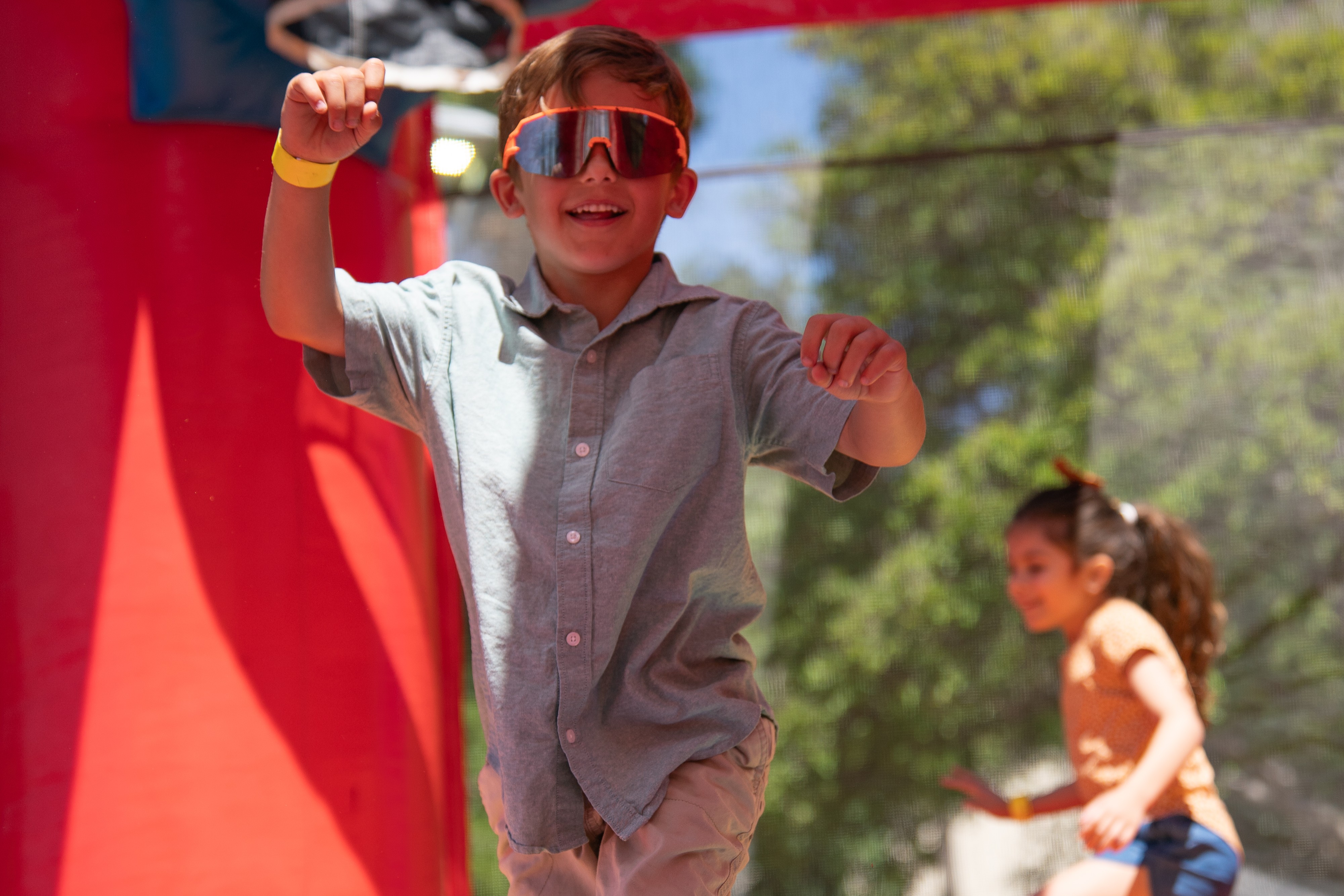 Kids enjoying the bounce houses