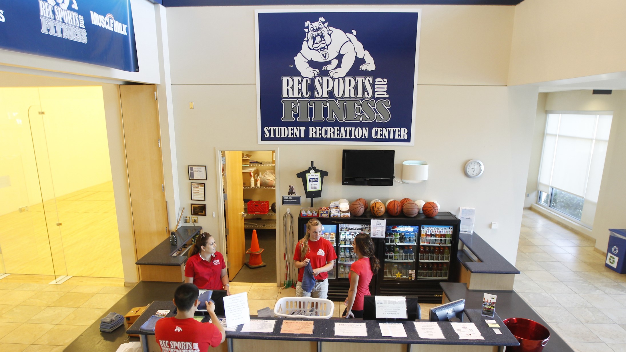 Student employees work the front desk of the Student Rec Center